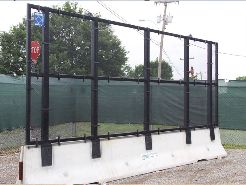 Expanded metal fencing with razor ribbon options for security in Collierville Tennessee